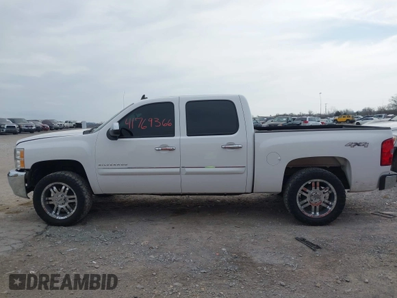 2013 Chevrolet Silverado 1500 LT with VIN 3GCPKSE71DG300433, listed as a IAAI auction lot 41769366 with 210,857 mi miles. Bid and sale history available at carsss.com. Image 14.