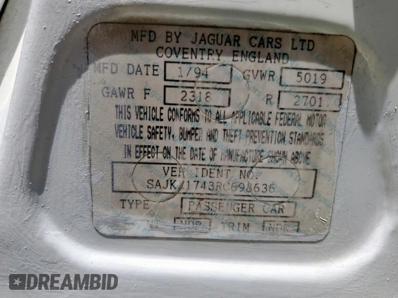 1994 Jaguar XJ with VIN SAJKX1743RC698636, listed as a Copart auction lot 56376685 with 192,928 mi miles and Salvage title. Bid and sale history available at DreamBid. Image 12.