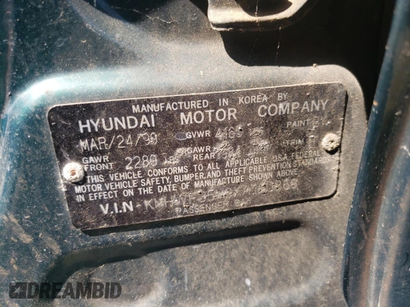 1999 Hyundai Sonata GLS with VIN KMHWF35V9XA100869, listed as a Copart auction lot 68219694 with 144,388 mi miles and Non Repairable. Bid and sale history available at carsss.com. Image 12.