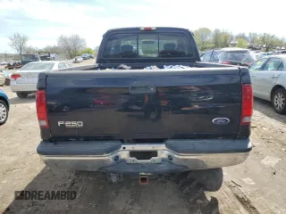 2002 Ford Super Duty F-250 XL with VIN 1FTNX21L32EA33392, listed as a Copart auction lot 49877554 with 0 mi miles and Salvage Title. Bid and sale history available at carsss.com. Image 6.