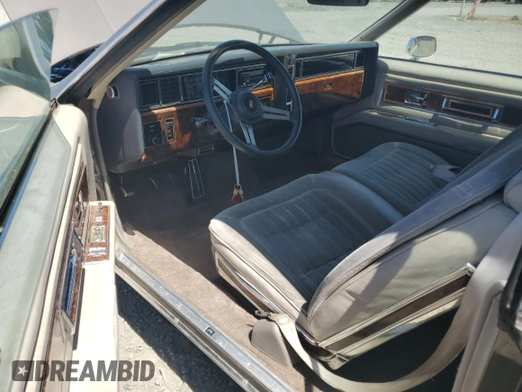 1983 Oldsmobile Toronado with VIN 1G3AZ57Y8DE312949, listed as a Copart auction lot 65228244 with 159,172 mi miles and Salvage Title. Bid and sale history available at DreamBid. Image 8.