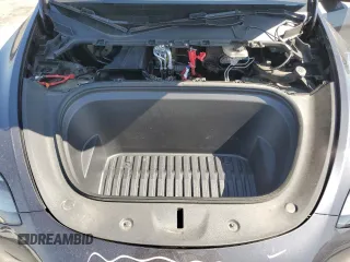 2024 Tesla Model Y Long Range z VIN 7SAYGDEE5RA244641, wystawiony jako Copart lot #51864845 z przebiegiem 23 096 mil mil oraz Szkoda całkowita • Salvage title. Historia ofert i sprzedaży dostępna na DreamBid. Obrazek 13.
