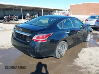 2014 Nissan Altima S with VIN 1N4AL3AP0EC284735, listed as a IAAI auction lot 41212568 with 194,625 mi miles and . Bid and sale history available at DreamBid. Image 4.