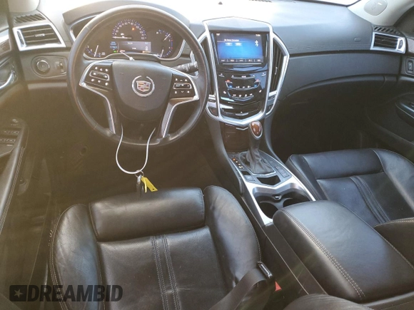 2015 Cadillac SRX Performance Collection with VIN 3GYFNFE39FS556708, listed as a Copart auction lot 41670355 with 177,601 mi miles and Salvage title. Bid and sale history available at DreamBid. Image 8.