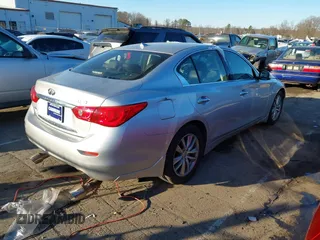 2017 Infiniti Q50 Premium with VIN JN1EV7AR7HM832424, listed as a IAAI auction lot 41372421 with 65,140 mi miles and . Bid and sale history available at DreamBid. Image 4.