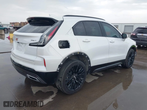 2024 Cadillac XT4 FWD Sport with VIN 1GYFZER42RF246488, listed as a IAAI auction lot 42029551 with 6,476 mi miles and . Bid and sale history available at DreamBid. Image 4.