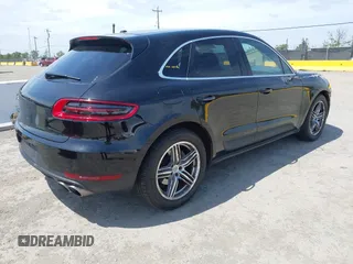 2015 Porsche Macan S with VIN WP1AB2A53FLB68323, listed as a IAAI auction lot 42121576 with 102,031 mi miles. Bid and sale history available at carsss.com. Image 4.