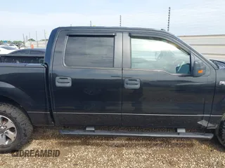 2012 Ford F-150 XL with VIN 1FTEW1CM5CFB80098, listed as a IAAI auction lot 42098438 with 216,694 mi miles. Bid and sale history available at carsss.com. Image 13.