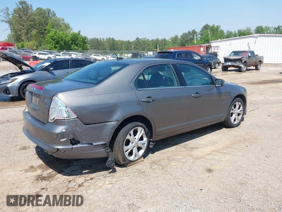2012 Ford Fusion SE z VIN 3FAHP0HA4CR232641, wystawiony jako IAAI lot #42057070 z przebiegiem 180 793 mil mil oraz . Historia ofert i sprzedaży dostępna na DreamBid. Obrazek 4.
