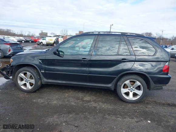 2006 BMW X5 4.4i with VIN 5UXFB53506LV22836, listed as a IAAI auction lot 41727708 with 186,084 mi miles. Bid and sale history available at carsss.com. Image 14.