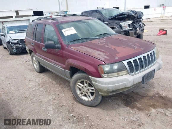 2003 Jeep Grand Cherokee Laredo with VIN 1J4GX48S83C576892, listed as a IAAI auction lot 42082865 with 212,157 mi miles. Bid and sale history available at carsss.com. Image 1.