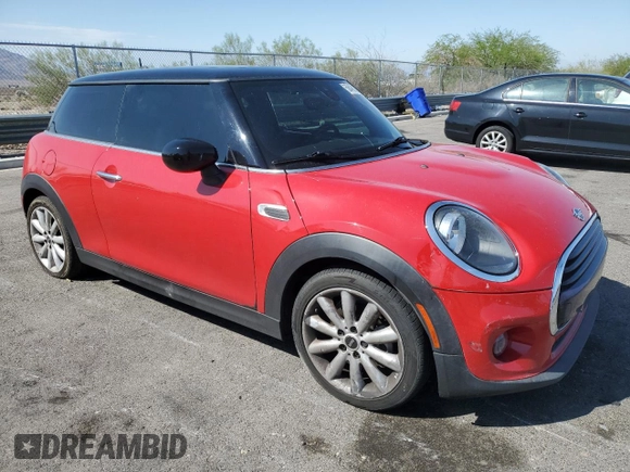 2021 MINI Hardtop Oxford Edition with VIN WMWXR3C09M2N13515, listed as a Copart auction lot 58490325 with 77,064 mi miles and Salvage title. Bid and sale history available at DreamBid. Image 4.