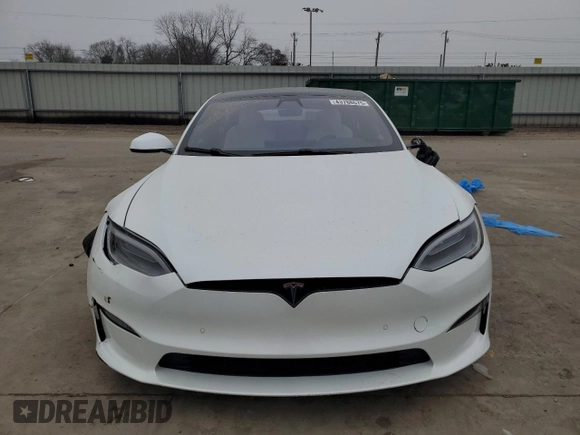 2021 Tesla Model S Plaid с VIN 5YJSA1E6XMF455258, выставлен на аукционе Copart как лот 43788675 с пробегом Не указан миль и Списание • Salvage title. История ставок и продаж доступна на DreamBid. Изображение 5.
