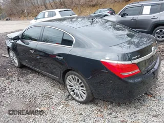 2014 Buick LaCrosse Premium II with VIN 1G4GF5G39EF172201, listed as a IAAI auction lot 41963281 with 106,231 mi miles and . Bid and sale history available at DreamBid. Image 3.