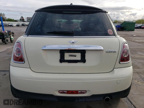2012 MINI Hardtop with VIN WMWSU3C51CT186184, listed as a Copart auction lot 55090935 with 100,669 mi miles and Salvage Title. Bid and sale history available at DreamBid. Image 6.