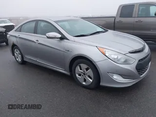 2012 Hyundai Sonata Hybrid z VIN KMHEC4A44CA020302, wystawiony jako IAAI lot #41210216 z przebiegiem 386 054 mil mil oraz . Historia ofert i sprzedaży dostępna na DreamBid. Obrazek 1.
