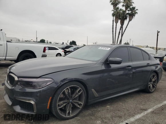2019 BMW 5 Series M550i xDrive with VIN WBAJB9C59KB287501, listed as a Copart auction lot 59732425 with 74,345 mi miles and Salvage title. Bid and sale history available at DreamBid. Image 1.