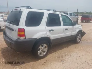 2005 Ford Escape XLT with VIN 1FMYU03125KE16019, listed as a IAAI auction lot 42256715 with 222,592 mi miles and . Bid and sale history available at DreamBid. Image 4.