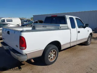 1998 Ford F-150 Standard with VIN 1FTZX1726WKB46576, listed as a IAAI auction lot 41881427 with 168,864 mi miles. Bid and sale history available at carsss.com. Image 4.