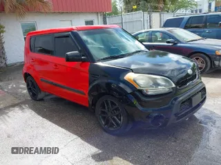 2011 Kia Soul + with VIN KNDJT2A21B7230986, listed as a IAAI auction lot 41683588 with 175,790 mi miles. Bid and sale history available at carsss.com. Image 1.