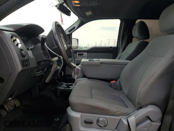 2011 Ford F-150 XLT with VIN 1FTFW1ET4BFC98666, listed as a Copart auction lot 59034455 with 175,742 mi miles and Salvage title. Bid and sale history available at DreamBid. Image 7.