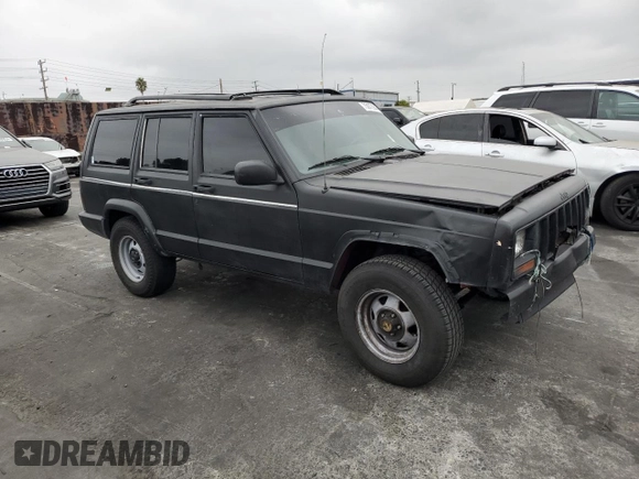 1998 Jeep Cherokee SE with VIN 1J4FT28S1WL203077, listed as a Copart auction lot 75872944 with 184,840 mi miles and Salvage Title. Bid and sale history available at carsss.com. Image 4.