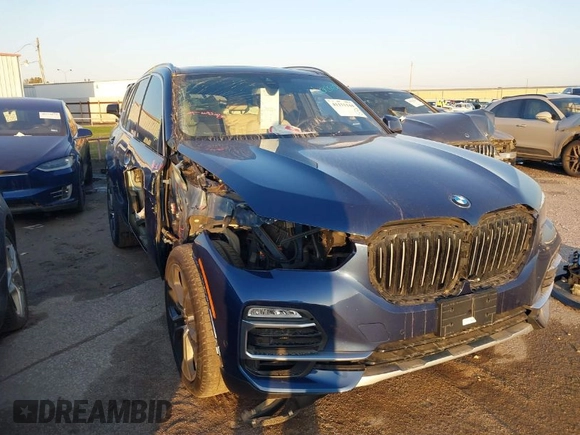2021 BMW X5 sDrive40i with VIN 5UXCR4C01M9F02587, listed as a IAAI auction lot 41111144 with 23,844 mi miles. Bid and sale history available at carsss.com. Image 1.