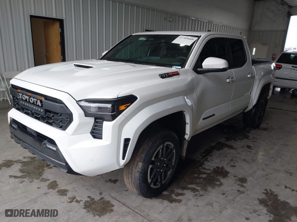 2024 Toyota Tacoma 4WD SR5 with VIN 3TMLB5JN8RM035278, listed as a IAAI auction lot 41789088 with 10,695 mi miles. Bid and sale history available at carsss.com. Image 2.