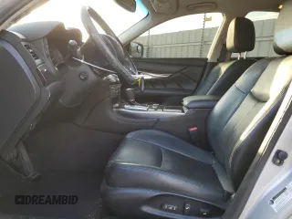 2012 Infiniti M with VIN JN1BY1AP9CM336121, listed as a Copart auction lot 71656374 with 125,497 mi miles and Salvage Title. Bid and sale history available at DreamBid. Image 7.