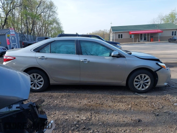 2016 Toyota Camry XLE with VIN 4T4BF1FK5GR582980, listed as a IAAI auction lot 42145802 with 85,702 mi miles and . Bid and sale history available at DreamBid. Image 14.