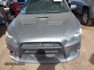 2014 Mitsubishi Lancer Evolution GSR with VIN JA32W8FV3EU008262, listed as a IAAI auction lot 41653902 with 128,977 mi miles. Bid and sale history available at carsss.com. Image 6.