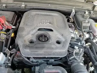 2020 Jeep Wrangler Sport S with VIN 1C4GJXAN5LW263889, listed as a Copart auction lot 65509495 with 62,716 mi miles and Salvage title. Bid and sale history available at DreamBid. Image 13.