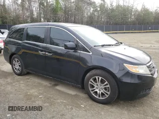 2012 Honda Odyssey EX-L with VIN 5FNRL5H67CB025164, listed as a Copart auction lot 51873715 with 110,260 mi miles and Salvage Title. Bid and sale history available at carsss.com. Image 4.