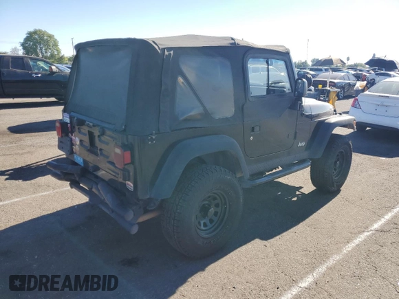 2005 Jeep Wrangler Rubicon with VIN 1J4FA69SX5P343826, listed as a Copart auction lot 69074374 with 179,610 mi miles and Salvage Title. Bid and sale history available at carsss.com. Image 3.