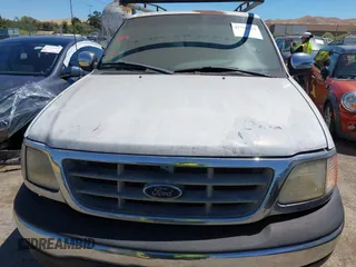 2001 Ford F-150 XLT with VIN 1FTRW07W21KE19926, listed as a IAAI auction lot 42750523 with Not provided miles and . Bid and sale history available at DreamBid. Image 6.