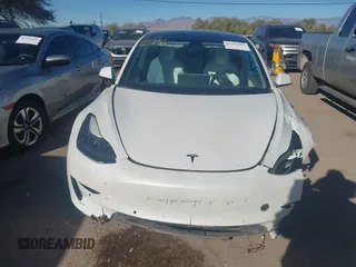 2021 Tesla Model 3 Performance with VIN 5YJ3E1EC6MF926448, listed as a IAAI auction lot 41240309 with 39,386 mi miles and . Bid and sale history available at DreamBid. Image 12.