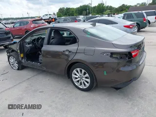 2019 Toyota Camry LE with VIN 4T1B11HKXKU818442, listed as a IAAI auction lot 41906128 with 30,728 mi miles and . Bid and sale history available at DreamBid. Image 3.