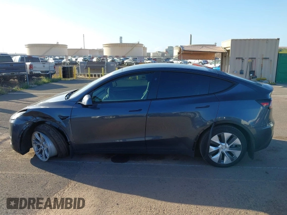 2023 Tesla Model Y Long Range with VIN 7SAYGDEE0PF928836, listed as a IAAI auction lot 41538742 with 9,630 mi miles and . Bid and sale history available at DreamBid. Image 14.