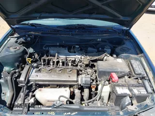 1997 Toyota Corolla with VIN 1NXBA02E3VZ517237, listed as a IAAI auction lot 42772332 with 185,045 mi miles and . Bid and sale history available at DreamBid. Image 10.