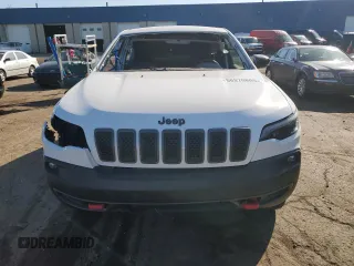 2022 Jeep Cherokee Trailhawk with VIN 1C4PJMBX1ND524383, listed as a Copart auction lot 56370805 with 25,145 mi miles and Salvage title. Bid and sale history available at DreamBid. Image 5.