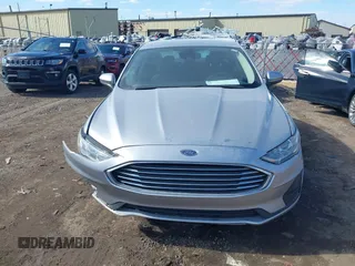 2020 Ford Fusion SE z VIN 3FA6P0LU8LR163896, wystawiony jako IAAI lot #41994803 z przebiegiem 89 892 mil mil oraz . Historia ofert i sprzedaży dostępna na DreamBid. Obrazek 12.