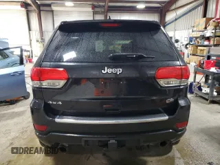 2014 Jeep Grand Cherokee Overland with VIN 1C4RJFCT9EC264594, listed as a Copart auction lot 50071695 with 124,712 mi miles and Clean Title. Bid and sale history available at DreamBid. Image 6.