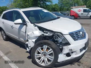 2015 Cadillac SRX Luxury Collection z VIN 3GYFNEE31FS610626, wystawiony jako IAAI lot #42298705 z przebiegiem 98 959 mil mil oraz . Historia ofert i sprzedaży dostępna na DreamBid. Obrazek 1.