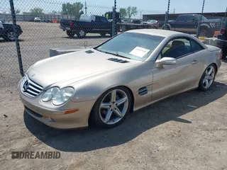 2004 Mercedes-Benz SL 500 z VIN WDBSK75F34F071610, wystawiony jako IAAI lot #42042918 z przebiegiem Nie podano mil oraz . Historia ofert i sprzedaży dostępna na DreamBid. Obrazek 2.