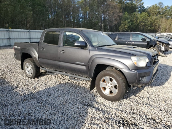 2015 Toyota Tacoma PreRunner with VIN 3TMJU4GN5FM180924, listed as a Copart auction lot 50864315 with 176,562 mi miles and Salvage title. Bid and sale history available at DreamBid. Image 4.
