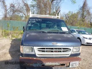 2002 Ford Econoline Cargo with VIN 1FTRE142X2HA67221, listed as a IAAI auction lot 42079493 with 180,324 mi miles. Bid and sale history available at carsss.com. Image 6.