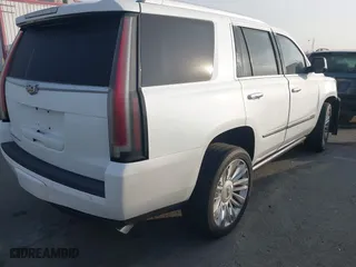 2016 Cadillac Escalade Platinum with VIN 1GYS4DKJ5GR260260, listed as a IAAI auction lot 41476668 with 108,058 mi miles. Bid and sale history available at carsss.com. Image 4.