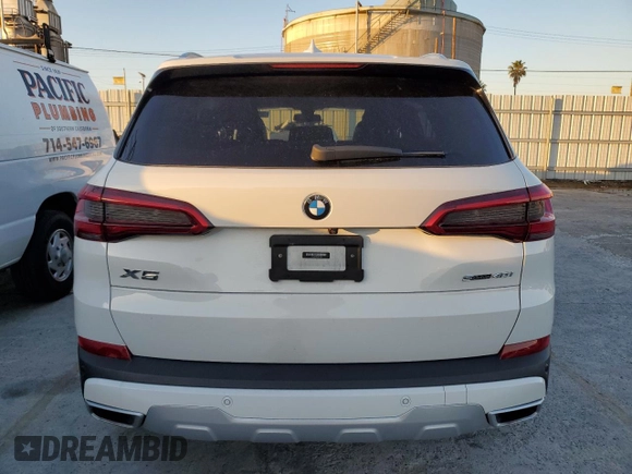 2020 BMW X5 sDrive40i with VIN 5UXCR4C03L9B14243, listed as a Copart auction lot 38179513 with 0 mi miles. Bid and sale history available at carsss.com. Image 6.