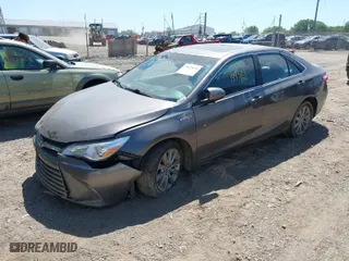 2016 Toyota Camry Hybrid LE with VIN 4T1BD1FK4GU199788, listed as a IAAI auction lot 41776667 with 149,521 mi miles. Bid and sale history available at carsss.com. Image 2.