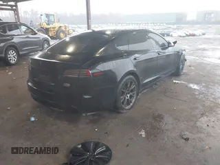 2022 Tesla Model S Plaid with VIN 5YJSA1E64NF477855, listed as a IAAI auction lot 41470591 with Not provided miles and . Bid and sale history available at DreamBid. Image 4.